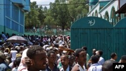 FILE: In a previous demonstration, Muslims gather outside Addis Ababa's Anwar mosque on October 19, 2012 to protest against the government interfering in religious affairs. Protestors say the government is trying to impose the moderate Al-Ahbash strain, alien to Ethiopia.