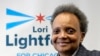 La alcaldesa de Chicago, Lori Lightfoot, sonríe mientras escucha durante el mitin Mujeres por Lori en Chicago, el sábado 25 de febrero de 2023. (Foto AP/Nam Y. Huh)