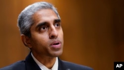 FILE - U.S. Surgeon General Dr. Vivek Murthy testifies on mental health care before a Senate committee on Capitol Hill in Washington, Feb. 8, 2022.