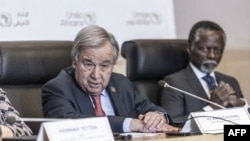 United Nation's Secretary-General Antonio Guterres (L) speaks during a press conference after the end of the 36th Ordinary Session of the Assembly of the African Union (AU) at the Africa Union headquarters in Addis Ababa on February 18, 2023.