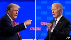 조 바이든 대통령(오른쪽)과 도널드 트럼프 전 대통령의 토론회가 27일 밤 조지아주 애틀랜타의 ‘CNN’ 스튜디오에서 열렸다. 
