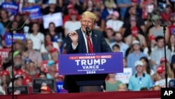 Republican presidential candidate former President Donald Trump speaks at a campaign rally in Grand Rapids, Michigan, July 20, 2024. 