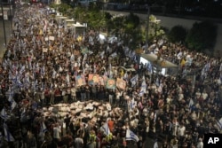 People protest against Israeli Prime Minister Benjamin Netanyahu's government and call for the release of hostages held in the Gaza Strip by the Hamas militant group, in Tel Aviv, Israel, June 1, 2024.