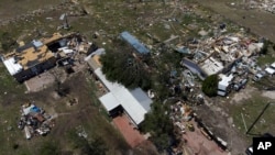 Destroyed homes are seen after a deadly tornado rolled through the previous night, May 26, 2024, in Valley View, Texas.