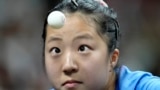 South Korea's Shin Yubin watches the ball during a mixed doubles semifinal table tennis game against China's Wang Chuqin and Sun Yingsha, at the 2024 Summer Olympics, July 29, 2024, in Paris, France. 