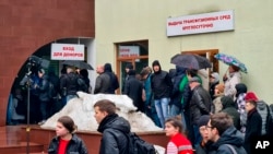 People lineup to donate blood to help victims of the attack in Crocus City Hall, near the Blood Center of the Federal Medical and Biological Agency, in Moscow, Russia, Saturday, March 23, 2024.