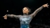 Simone Biles shakes off leg injury to dominate during Olympic gymnastics qualifying  
