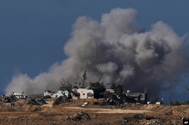 Smoke rises following an Israeli bombardment in the Gaza Strip, as seen from southern Israel, Jan.7, 2024.
