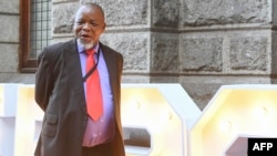 FILE - Minister of Mineral Resources and Energy of South Africa Gwede Mantashe arrives ahead of the 2023 state-of-the-nation address (SONA) at the Cape Town City Hall in Cape Town, Feb. 9, 2023.