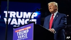 FILE - Republican presidential nominee former President Donald Trump speaks at a campaign rally at Desert Diamond Arena in Glendale, Arizona, Aug. 23, 2024.