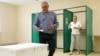 Lithuanians vote in presidential runoff amid Russia fears