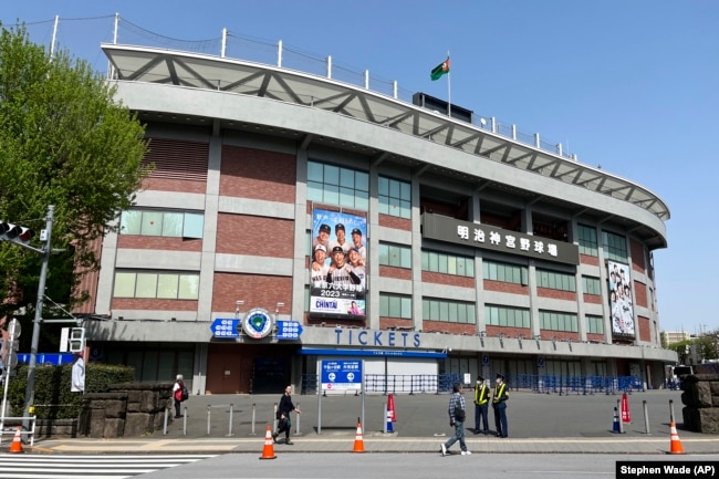 The Meiji Jingu baseball stadium is seen Tuesday, April 11, 2023, in Tokyo. The historic stadium where Babe Ruth played could be demolished, part of a disputed redevelopment plan harshly criticized by environmentalists. (AP Photo/Stephen Wade)