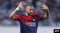 FILE - Paris Saint-Germain's Neymar waves after the soccer friendly between his French club and Saudi Arabia's Al-Nassr in Osaka, Japan, on July 25, 2023. The Brazilian star has signed with Saudi club Al Hilal, it was announced on Aug. 15, 2023.