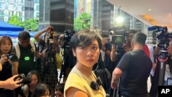 Selina Cheng, a former reporter at The Wall Street Journal and newly elected chairperson of the Hong Kong Journalists Association, speaks to media in Hong Kong on July 17, 2024.