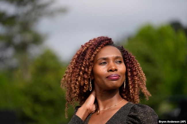 Culix Wibonele is a certified nursing assistant working in long-term care in Lawrenceville, Geogia, April 29, 2024. (AP Photo/Brynn Anderson)