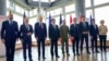 Ukrainian President Volodymyr Zelenskyy, center, meets with G-7 leaders before a session about Ukraine during the G-7 Summit in Hiroshima, Japan, May 21, 2023.