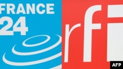 This combination of file pictures created on Aug. 3, 2023, shows the logo of the live news channel France 24, left, and the logo of Radio France Internationale (RFI). On August 3, the signals of Radio France Internationale and France 24 were blocked inside Niger.