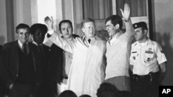 FILE - Former U.S. President Jimmy Carter, Jan. 21, 1981, arrives at the U.S. Air Force hospital in Wiesbaden, Germany, to greet the hostages released by Iran after 445 days of captivity.