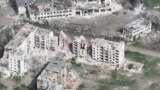 This photo taken from a drone video provided by Ukraine Patrol Police shows devastation in Chasiv Yar, Ukraine, April 29, 2024.