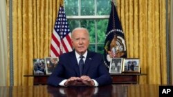 President Joe Biden addresses the nation from the Oval Office of the White House in Washington, July 14, 2024, about the assassination attempt targeting Republican presidential candidate former President Donald Trump at a campaign rally in Pennsylvania. 