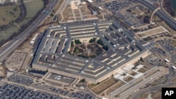FILE - The Pentagon in Arlington, Virginia, March 2, 2022. A new Pentagon study that examined reported sightings of UFOs over nearly the last century has found no evidence of aliens or extraterrestrial intelligence.