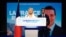 French far-right leaders Marine Le Pen, left, and Jordan Bardella address supporters after the polls closed during the European Parliament elections, in Paris, France, June 9, 2024.