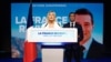 Pemimpin sayap kanan Prancis Marine Le Pen, kiri, dan Jordan Bardella berbicara kepada para pendukungnya setelah pemungutan suara ditutup selama pemilihan Parlemen Eropa, di Paris, Prancis, 9 Juni 2024.