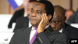 FILE - Zambian President Hakainde Hichilema listens during the closing session of the New Global Financial Pact Summit, in Paris, France, June 23, 2023. 