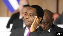 FILE - Zambian President Hakainde Hichilema listens during the closing session of the New Global Financial Pact Summit, in Paris, France, June 23, 2023. 