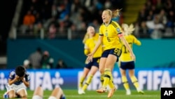 Sweden's Magdalena Eriksson celebrates at the end of the Women's World Cup quarterfinal soccer match between Japan and Sweden at Eden Park in Auckland, New Zealand, Aug. 11, 2023. 