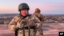 FILE - This undated handout photo taken from video released by Prigozhin Press Service, March 3, 2023, shows Yevgeny Prigozhin, owner of the Wagner Group military company, at an undisclosed location in Ukraine.