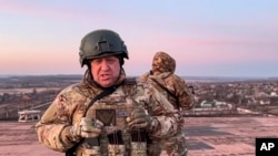 FILE - This undated handout photo taken from video released by Prigozhin Press Service, March 3, 2023, shows Yevgeny Prigozhin, owner of the Wagner Group military company, at an undisclosed location in Ukraine.