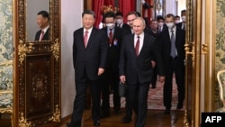 ရုရှားနိုင်ငံ မော်စကိုမြို့ ခရင်မလင်နန်းတော်မှာ တရုတ်သမ္မတရှီကျင့်ဖျင်(ဝဲ)နဲ့ ရုရှားသမ္မတဗလာဒီမီယာပူတင် (ယာ)တို့ ဒုတိယနေ့တွေ့ဆုံနေကြစဉ် (မတ် ၂၁ဈ ၂၀၂၃)