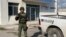 A Mexican army soldier guards the Tamaulipas State Prosecutor's headquarters in Matamoros, Mexico, March 8, 2023. 