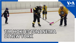 Tim Hoki Es Tunanetra di New York
