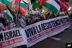 FILE - People march during a pro-Palestinian rally in Madrid on Dec. 2, 2023.