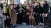 Afghan women stage a protest for their rights to mark International Women's Day, in Kabul, March 8, 2023.