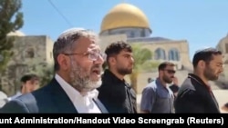 Israeli National Security Minister Itamar Ben-Gvir, left, visits Al-Aqsa compound also known to Jews as the Temple Mount, in Jerusalem's Old City on Aug. 13, 2024, in this video still obtained from a handout video. (Temple Mount Administration/Handout via Reuters)