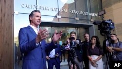 FILE - California Gov. Gavin Newsom speaks to reporters outside the California Natural Resources Agency in Sacramento, Calif., Oct. 7, 2022. 