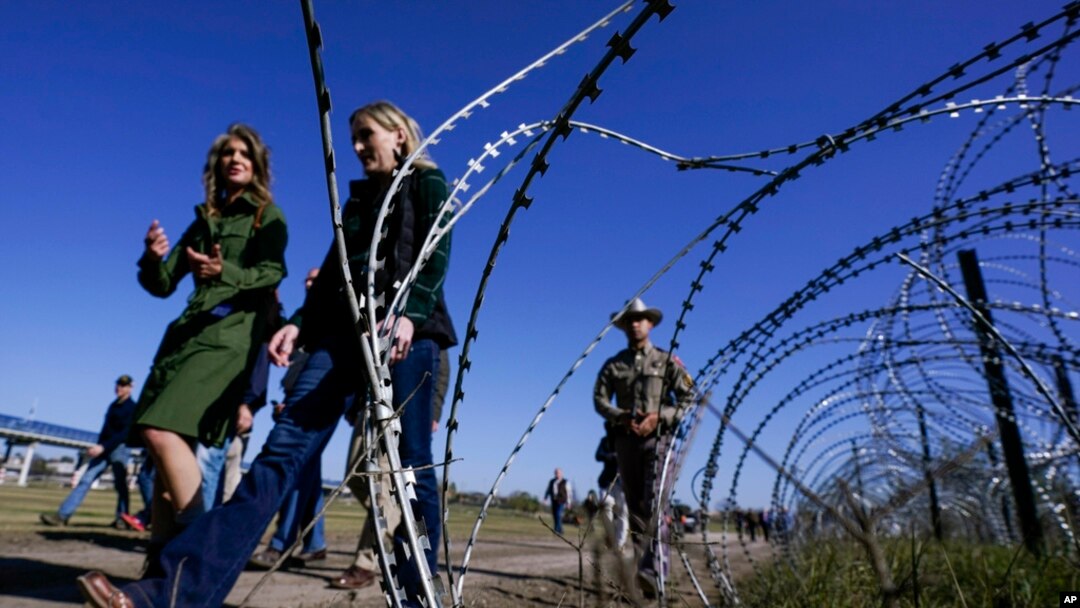 Concertina wire is seen as Republican members of Congress tour the Texas-Mexico border, Jan. 3, 2024, in Eagle Pass, Texas. 