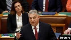 FILE - Hungarian Prime Minister Viktor Orban addresses the parliament in Budapest, Dec. 13, 2023.