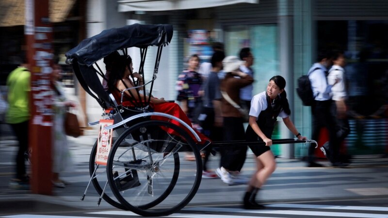 Japanese Women Drawn to Rickshaw Pulling