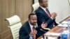 FILE - Ethiopia's Prime Minister Abiy Ahmed, left, accompanied by House speaker Tagesse Chafo, right, addresses the parliament in the capital Addis Ababa, Ethiopia on Nov. 15, 2022.