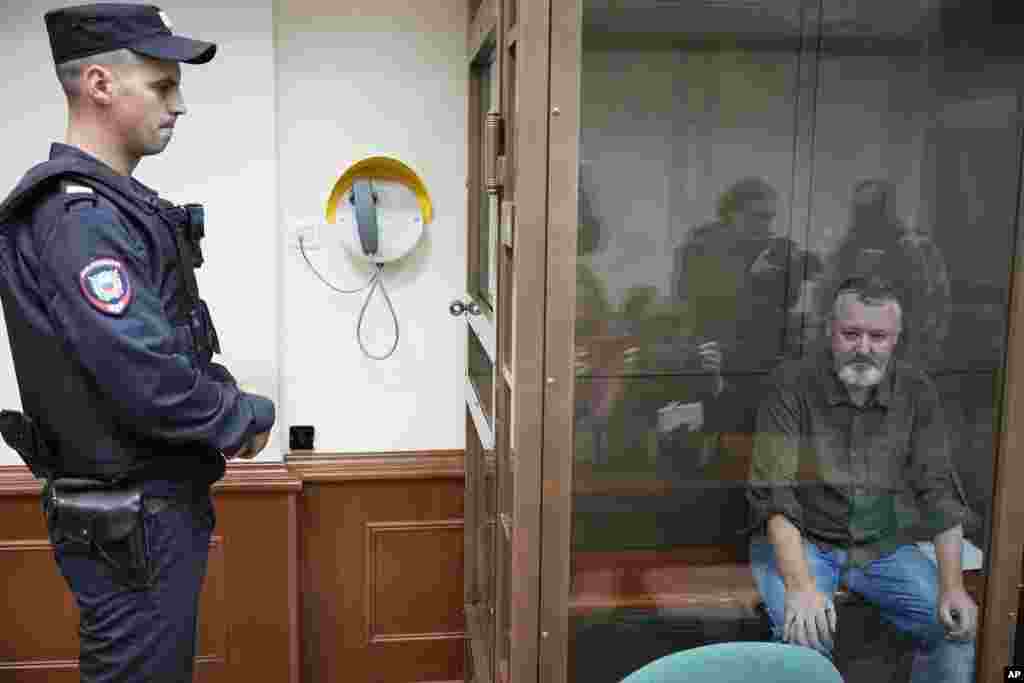 Igor Girkin, also know as Igor Strelkov, the former military chief for Russia-backed separatists in eastern Ukraine, sits in a glass cage in a courtroom at the Moscow&#39;s City Court in Moscow, Russia.&nbsp;A well-known Russian nationalist who accused President Vladimir Putin of weakness and indecision in Ukraine was detained on charges of extremism.&nbsp;