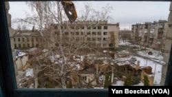 Before the war, locals say, residents of Lyman, Ukraine, worked in factories and for the railway. Now those jobs are gone and the city, part of which is pictured here on April 1, 2023, is bombed weekly. (Yan Boechat/VOA)