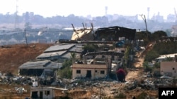 This picture taken from Israel's southern border with the Gaza Strip shows destruction in the Palestinian territory on June 5, 2024.