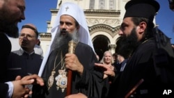 People greet newly elected Bulgarian Patriarch Daniil after his enthronement ceremony at Alexander Nevsky Cathedral in Sofia, Bulgaria, June 30, 2024.