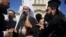 People greet newly elected Bulgarian Patriarch Daniil after his enthronement ceremony at Alexander Nevsky Cathedral in Sofia, Bulgaria, June 30, 2024.