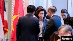 U.S. Commerce Secretary Gina Raimondo speaks with delegates during the Indo-Pacific Economic Framework meeting in Detroit, Michigan, May 27, 2023.