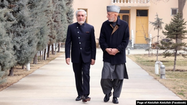 Abdullah Abdullah, left, and Hamid Karzai have remained in Kabul, Afghanistan, since the Taliban seized power.